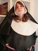 Topless nun with gigantic breasts bares her huge boobs at Big Tits Glamour - 38LL Anorei Collins from BigTitsGlamour.com