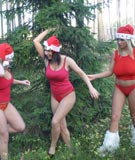 Ines Cudna, Malina May & Kora Kryk as lesbian Christmas elves at BoobsGarden.com