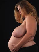 Hayley pregnant J-cup breasts from DivineBreasts.com