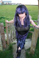 Vix goes goth tits-out in the graveyard at her BreastFiles Playmate Site