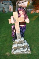 Vix goes goth tits-out in the graveyard at her BreastFiles Playmate Site