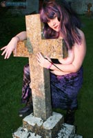 Vix goes goth tits-out in the graveyard at her BreastFiles Playmate Site