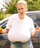 Abbi Secraa biggest breasts in a wet t-shirt plus huge tits pressed against glass in big boobs sexy topless car wash photos from AbbiSecraa.com