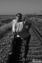 Alicia Loren big tits out on the train tracks in black and white boobs photos from BigTitsGlamour.com