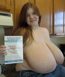 Lexxxi Luxe shows off her copy of Loving the Natural Big Boobs Goddess by David Martin Hilfiger plus the size of her massive tits of P-cup proportions at Divine Breasts - DivineBreasts.com